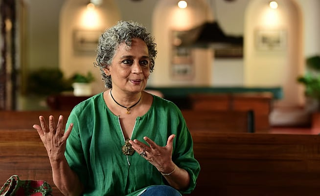 Glamorises tobacco use': PIL against Arundhati Roy's new book cover in  Kerala HC