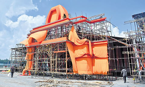 Workers setting up a pandal for the idol of Goddess Kanaka Durga. 