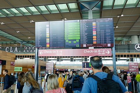 People at BER airport as a cyber attack has caused delays, in Berlin, Germany, Saturday, Sept 20, 2025.