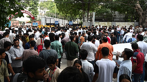 
Supporters of various candidates from different Student Unions contesting in DUSU Elections seen during election Vote Counting at North Campus, Delhi University in New Delhi on Friday.