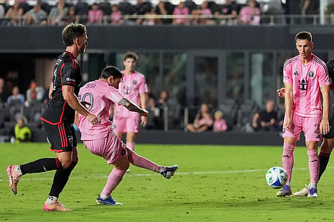 Inter Miami forward Lionel Messi, second left, scores his side's second goal against D.C. United during the second half of an MLS soccer match, Saturday, Sept. 20, 2025, in Fort Lauderdale, Fla.