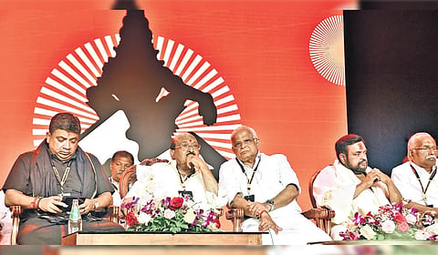 Tamil Nadu IT Minister Palanivel Thiaga Rajan, SNDP Yogam general secretary Vellappally Natesan, NSS vice-president M Sangeeth Kumar, thantri Kandararu Mohanaru, and Gokulam Group head Gokulam Gopalan attending the Global Ayyappa Sangamam at Pampa on Saturday 