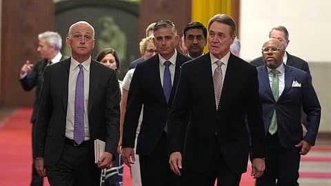 Rep. Adam Smith, D-Wash, left, leads a bipartisan group of U.S. lawmakers including from left Chrissy Houlahan, Democratic member of House Armed Services Committee, Michael Baumgartner, Republican member of House Foreign Affairs Committee, Ro Khanna, Democratic member of House Armed Services Committee and David Perdue, US Ambassador to China for a meeting with Chinese Premier Li Qiang at the Great Hall of the People in Beijing, China, Sunday, Sept. 21, 2025.