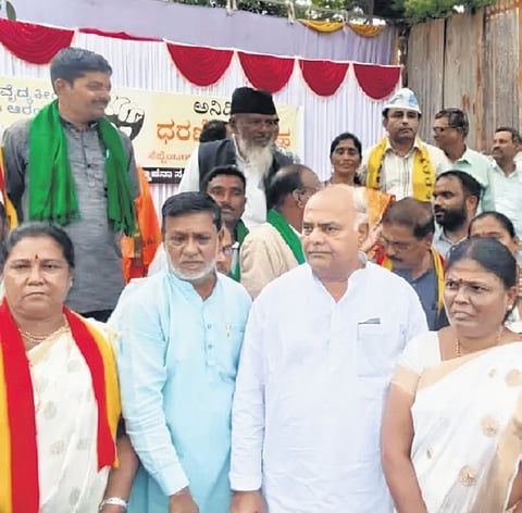 APMC Minister Shivanand Patil at the protest site in Vijayapura on Monday 