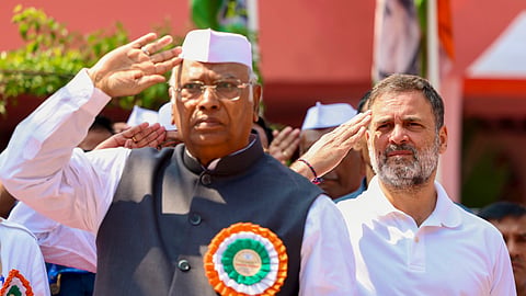 In this image received on Sept. 24, 2025, Congress President Mallikarjun Kharge with party leader and LoP in the Lok Sabha Rahul Gandhi during the party's flag hoisting ceremony before the extended Congress Working Committee (CWC) meeting, in Patna. 