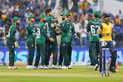 Pakistan cricket players celebrates the dismissal of Sri Lanka's Kusal Mendis during the Asia Cup Cricket match between Pakistan and Sri Lanka on Tuesday, Sept. 23, 2025.