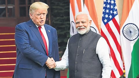 US President Donlad Trump shakes hands with Prime Minister Narendra Modi at a bilateral meeting 