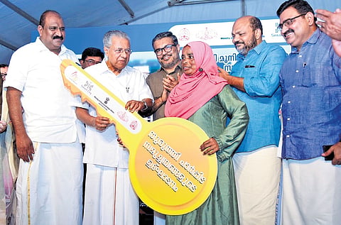 Chief Minister Pinarayi Vijayan inaugurating the Thuruthy housing complex at Fort Kochi on Saturday. Ministers M B Rajesh and P Rajeeve, MLA K J Maxi and Mayor 
M Anilkumar are also seen.