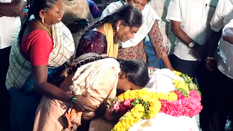 Bereaved family members and relatives of victims, who died after a stampede at actor-politician Vijay's rally on Saturday, mourn outside the mortuary at the Government Hospital, in Karur district, Tamil Nadu, Sunday, Sept. 28, 2025. 