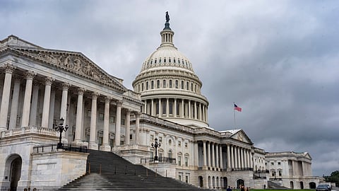 The US Capitol is seen during rainy weather just days before federal money runs out which could trigger a government shutdown, in Washington, Thursday, Sept. 25, 2025.