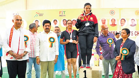 Excise Minister Kollu Ravindra presented medals to the yoga contest winners.