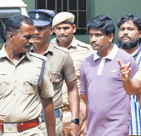 TVK functionaries VP Mathiyazhagan and Kasi Pounraj being produced before the Judicial Magistrate Court in Karur on Tuesday 