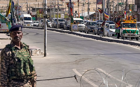 Mortal remains of 46-year-old ex-serviceman Tsewang Tharchin, a Kargil War veteran, who was killed in violence during recent protests for Ladakh statehood, being taken for his last rites amid curfew, in Leh, Monday, Sept. 29, 2025.