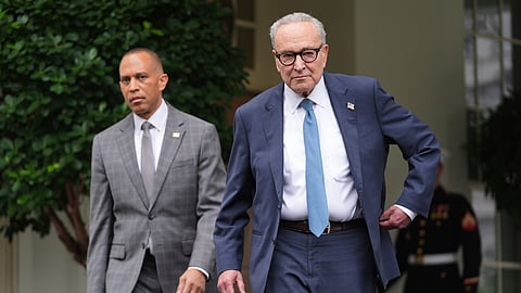 Senate Minority Leader Chuck Schumer, D-N.Y., right, and House Minority Leader Hakeem Jeffries, D-N.Y., walk speak to members of the media outside the West Wing at the White House in Washington, Monday, Sept. 29, 2025, in Washington. 