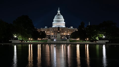 The US Capitol is seen lit up hours before a partial government shutdown is set to take effect in Washington, DC, 