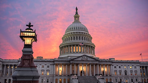 The US Capitol is seen at dusk as Democrats and Republicans in Congress are angrily blaming each other and refusing to budge from their positions on funding the government, in Washington, Tuesday, Sept. 30, 2025.