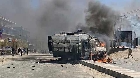 A police vehicle is set on fire during a protest by locals demanding statehood, in Ladakh, Wednesday, Sept. 24, 2025