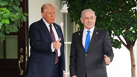 President Donald Trump, left, greets Israeli Prime Minister Benjamin Netanyahu at the White House, Monday, Sept. 29, 2025, in Washington. 