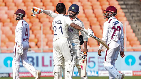 Indias Dhruv Jurel celebrates his century on day two of the first test cricket match between India and West Indies, at the Narendra Modi Stadium, in Ahmedabad, Gujarat, Friday, Oct. 3, 2025.