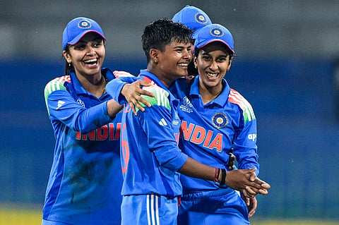 Kranti Gaud (C) celebrates with her teammates on Sunday 