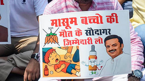 Members of National Students Union of India (NSUI) stage a protest over the death of children in Chhindwara due to suspected renal failure, allegedly caused by consumption of a cough syrup, at party office in Bhopal, Sunday, Oct. 5, 2025. 