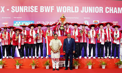 Players from China with the top prize on Saturday. Assam Chief Minister and Badminton Association of India president Himanta Biswa Sarma (front left) was also present during the trophy presentation ceremony. This was China's record 15th crown overall
