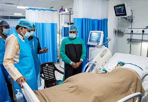 In this image posted on Oct. 9, 2025, Madhya Pradesh Chief Minister Mohan Yadav visits a hospital where children from Chhindwara who fell ill allegedly after consumption of a cough syrup are undergoing treatment. 