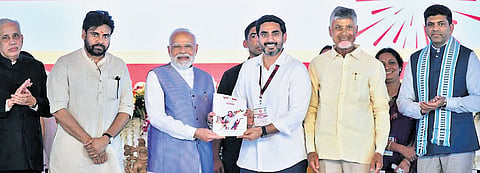 Prime Minister Narendra Modi, Chief Minister Nara Chandrababu Naidu, Deputy CM Pawan Kalyan, HRD Minister N Lokesh and Governor S Abdul Nazeer during the Super GST - Super Savings public meeting in Kurnool.