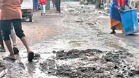 The sludge deposits in a KM Garden street which are yet to be removed 