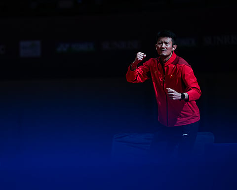 Chen Long reacts during a match on Saturday