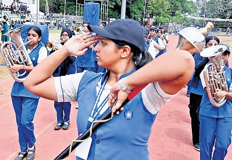 Students on Monday rehearse for the parade for the opening ceremony of the 
67th State School Sports Meet 