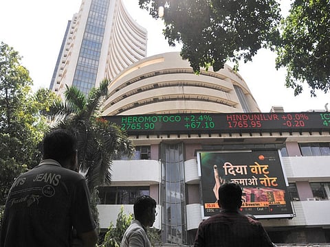 Markets close higher on surge in buying that helped the market recover from earlier losses