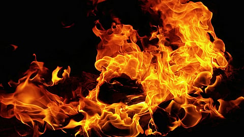 The fire, which reportedly originated from domestic articles due to firecrackers, prompted the DFS to rescue seven individuals.