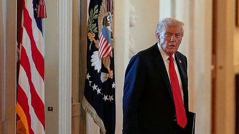 US President Donald Trump arrives to speak during an event to welcome the 2025 LSU and LSU-Shreveport national champion baseball teams in the East Room of the White House, Monday, Oct. 20, 2025, in Washington. 