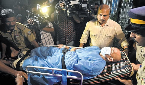 Kozhikode Rural SP K E Baiju, who was injured in the clash during the protest against the Fresh Cut animal waste recycling company at Ambayathode in Thamarassery, being shifted to a clinic in Nadakkavu for treatment. 