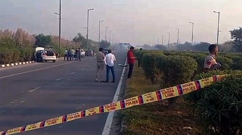 Police personnel investigate the site after at least four gangsters, including wanted Ranjan Pathak, have reportedly been shot dead in an encounter conducted by a joint team of Delhi Police Crime Branch and Bihar Police, in Rohini area, New Delhi, Thursday, Oct. 23, 2025.