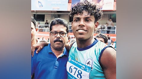 Athul T M with Ram Kumar after breaking the record set by the latter in 1988 