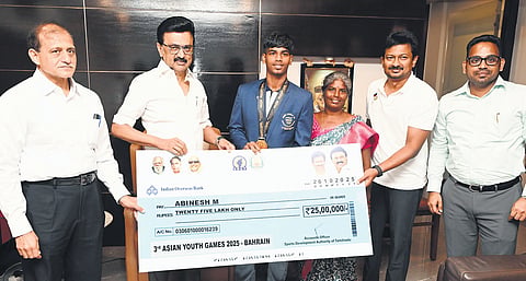 CM MK Stalin presenting a cheque to Abinesh Mohandhas on Sunday 