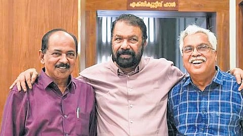 General Education Minister V Sivankutty with Civil Supplies Minister G R Anil and CPI state secretary Binoy Viswam.