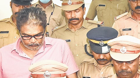 Police escort Murari Babu from Ranni Judicial First Class Magistrate Court to Thiruvananthapuram for detailed questioning on Tuesday.