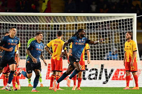 Napoli's Frank Anguissa, center, celebrates scoring during the Serie A soccer match between Lecce and Napoli, in Lecce, Italy, Tuesday Oct. 28, 2025. 