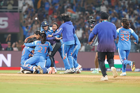 The Indian players celebrate after the win at the end of the ICC Women's Cricket World Cup 2025 one-day international (ODI) semi-final match between India and Australia at the DY Patil Stadium in Navi Mumbai on October 30, 2025. 