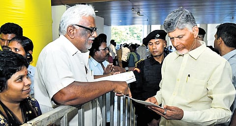 Chief Minister N Chandrababu Naidu accepts representations from the public at the TDP central party on Friday 