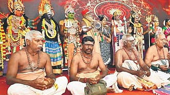 Odhuvars chanting hymns during the Sathaya Vizha in Thanjavur 