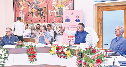 CM Majhi inaugurating the 44 new sub-registrar offices from Lok Seva Bhavan.