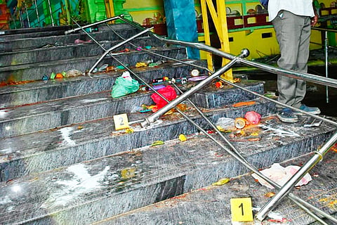Puja' items lie at the Venkateswara temple after a stampede, at Kasibugga in Srikakulam district, Saturday, Nov. 1, 2025. At least nine people were killed and several others suffered injuries in the incident. 