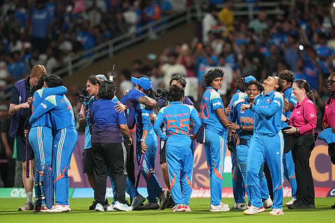 India's players celebrate after winning the ICC Women's Cricket World Cup final match between India and South Africa in Navi Mumbai, India, Sunday, Nov. 2, 2025. 