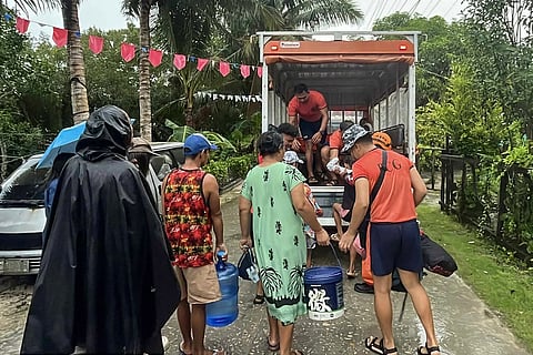 This handout photo taken on November 3, 2025 and received from the Philippine Coast Guard-Eastern Samar Station shows coast guard personnel assisting in evacuating residents in Guiuan town, Eastern Samar province, central Philippines, ahead of the landfall of Typhoon Kalmaegi.
Thousands were evacuated in coastal provinces of the central Philippines on November 3 as a typhoon gathered strength ahead of landfall in a region hit by some of the deadliest storms in the country's history.