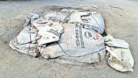 Silt catch pits that are below road level are covered with sandbags 