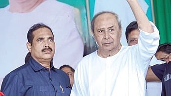BJD president Naveen Patnaik waves to people at his public meeting in Komna
of Nuapada district on Monday 